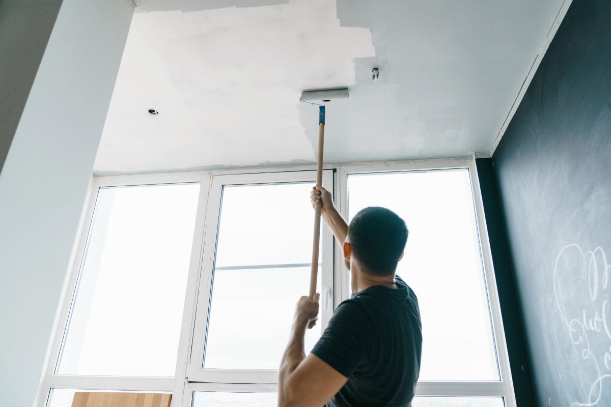 Man painting a ceiling 1200x800 1