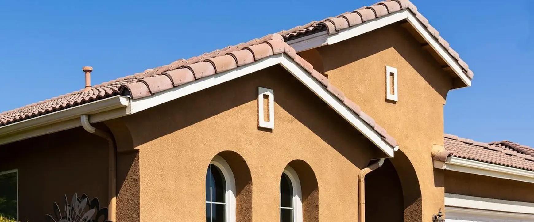 Beige exterior painting on a house